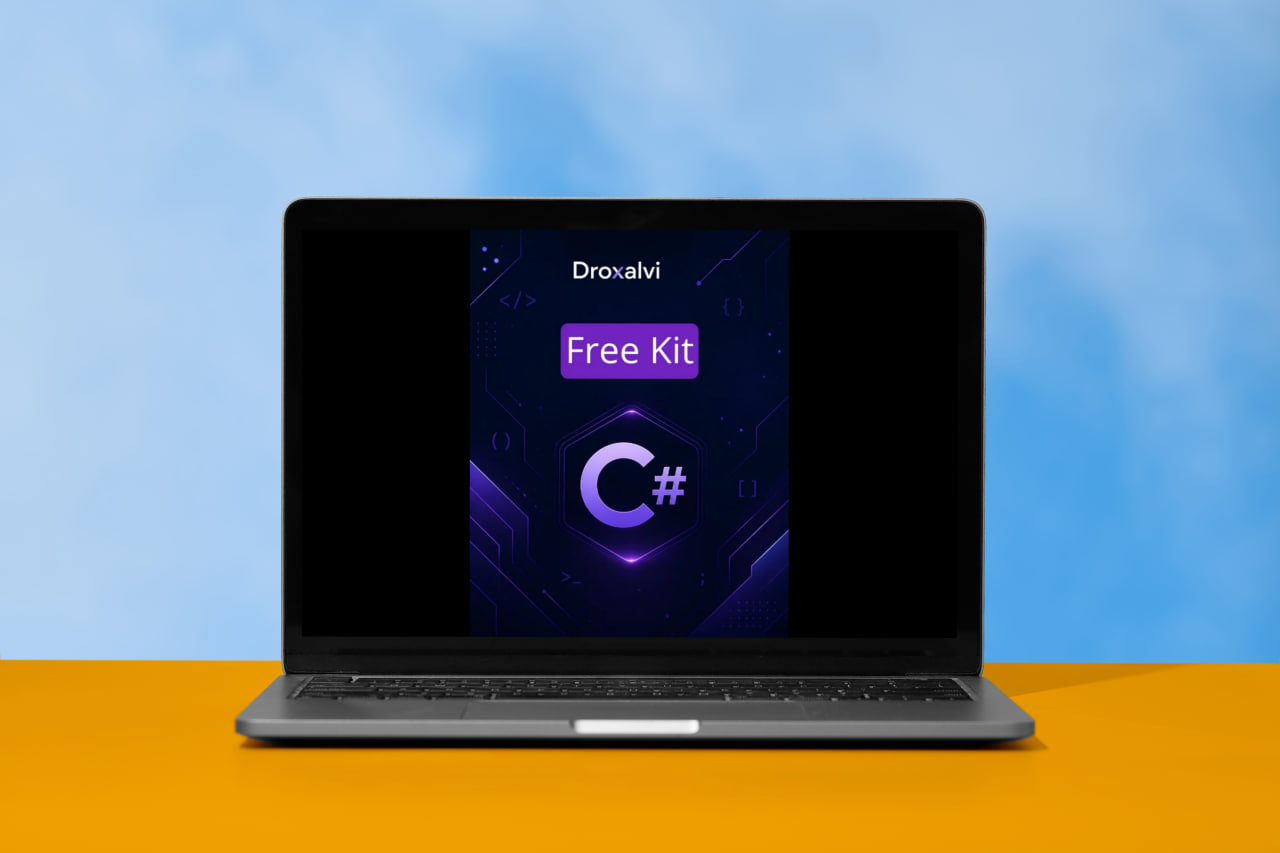 Laptop displaying Droxalvi Free Kit with C# logo on a blue and orange gradient background